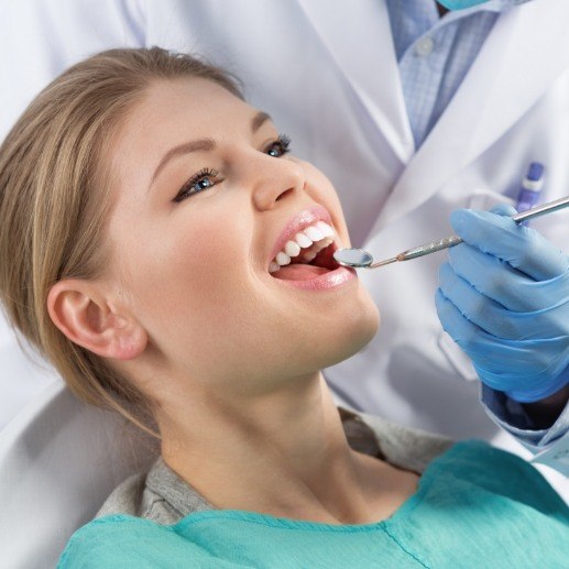 Dental patient receiving oral cancer screening