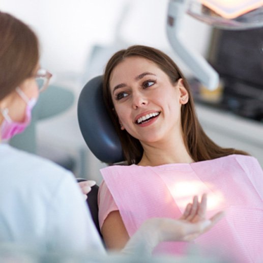 Woman smiling in the dental chair