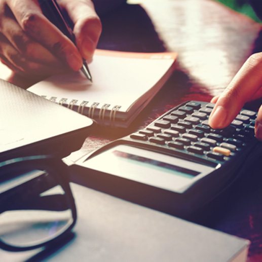 Woman using a calculator